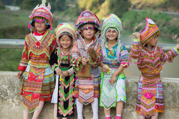 Ha Giang, Vietnam - Feb 13, 2016: Portrait of H'mong little girls wearing traditional dress during Lunar New Year holiday in Dong Van district